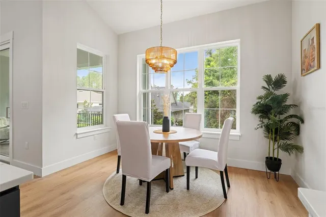 an empty room with wooden floor