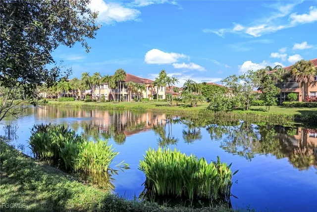 a view of a lake with a big yard