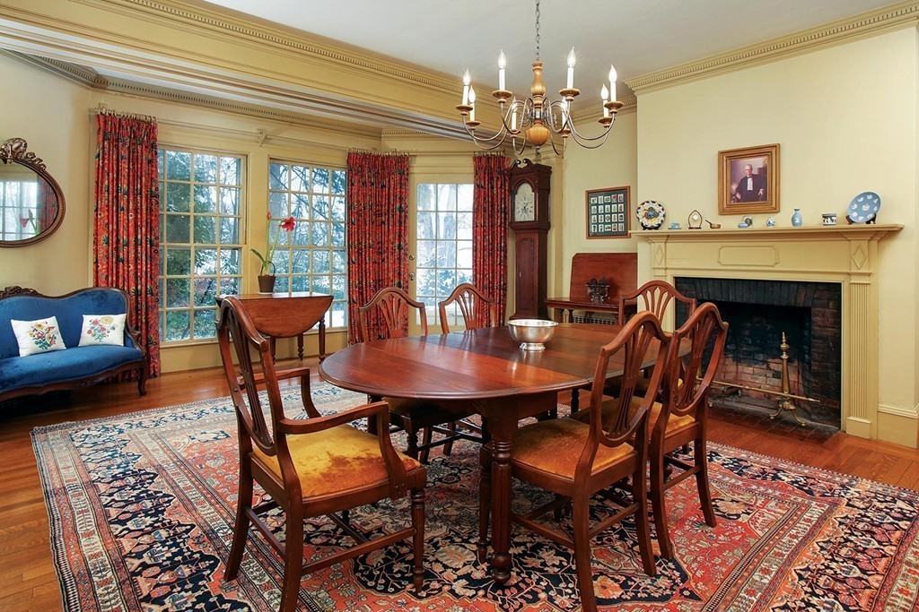 40 Dunster Road Brookline, MA 02467 - Photo 5 of 10 a dining room with furniture a chandelier and wooden floor
