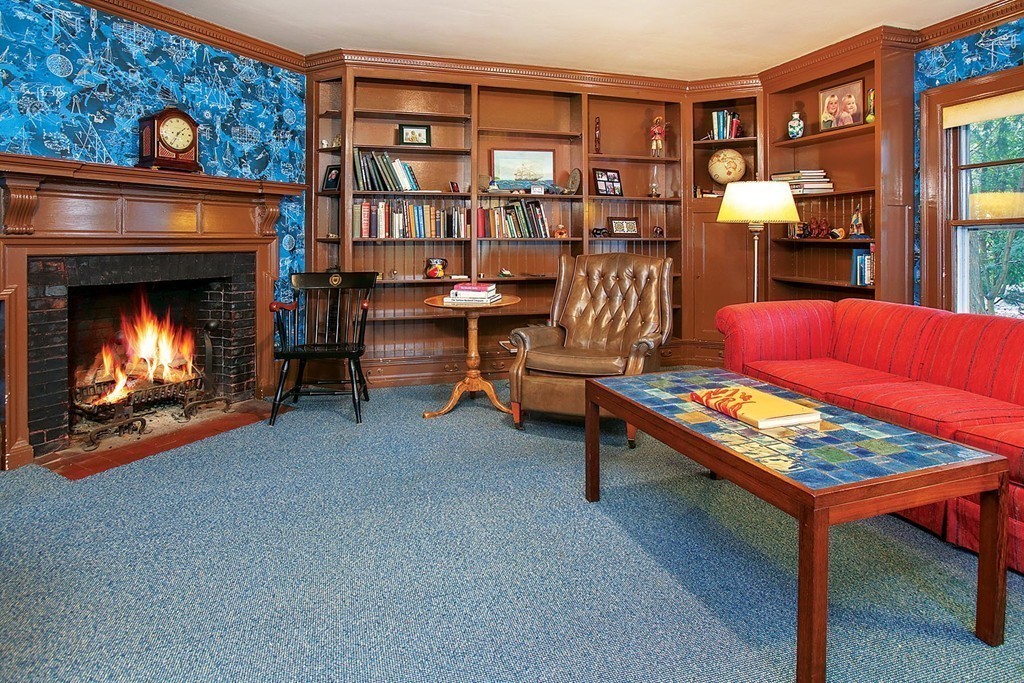 40 Dunster Road Brookline, MA 02467 - Photo 6 of 10 a living room with furniture and a fireplace