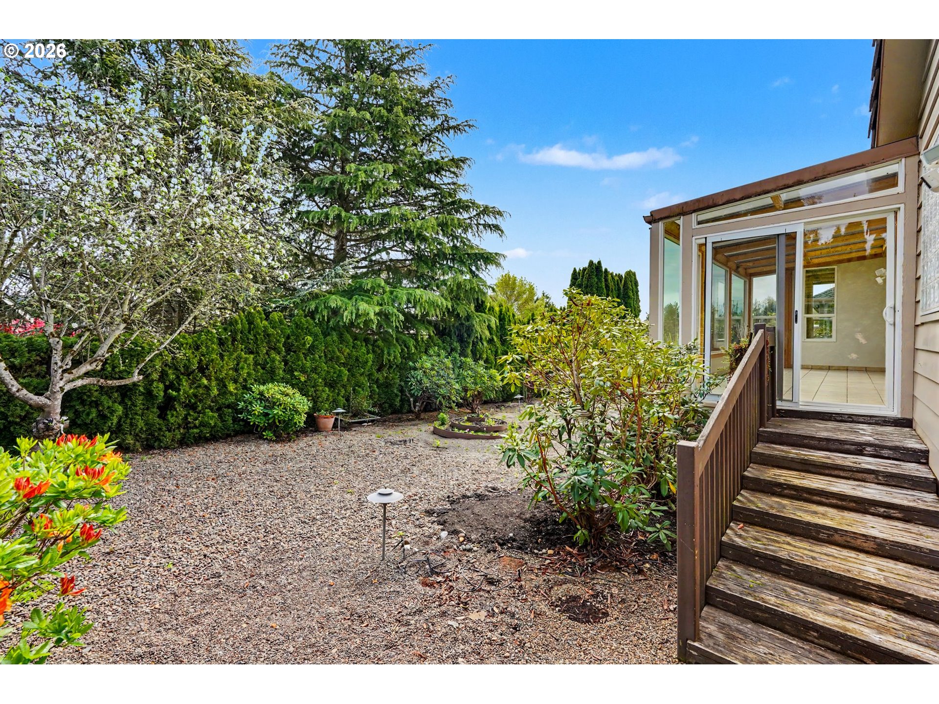 1470 Ranier Loop Northwest Salem, OR 97304 - Photo 45 of 48 a view of a backyard with garden