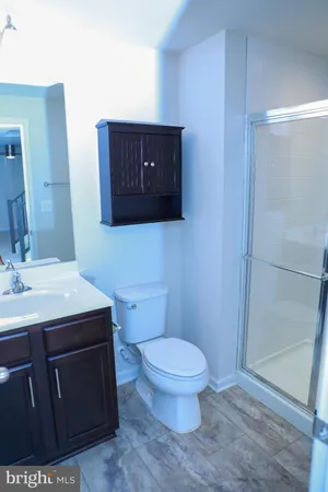 a bathroom with a bathtub and a window