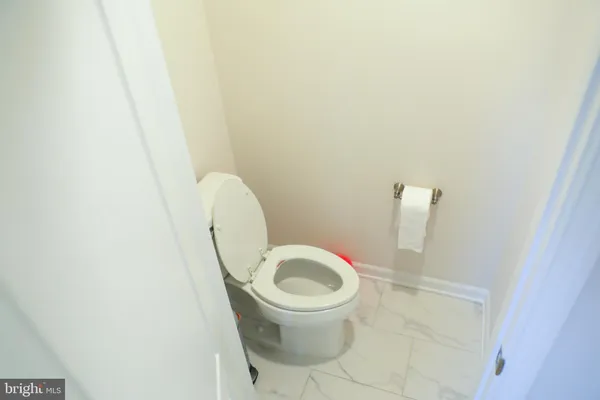 a view of table and chair in wooden floor