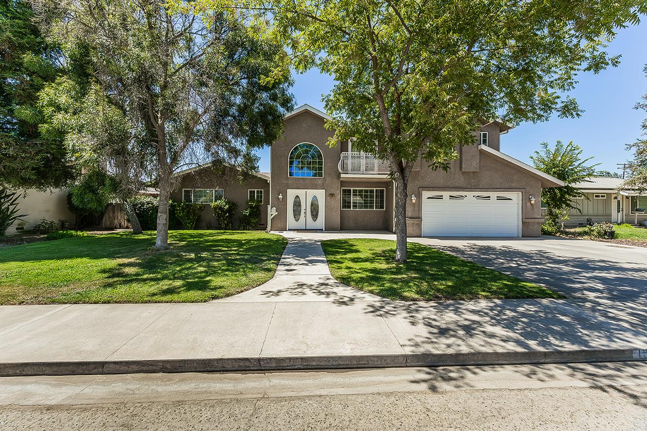 1563 South Klein Avenue Reedley, CA 93654 - Photo 2 of 81 front view of house with a yard