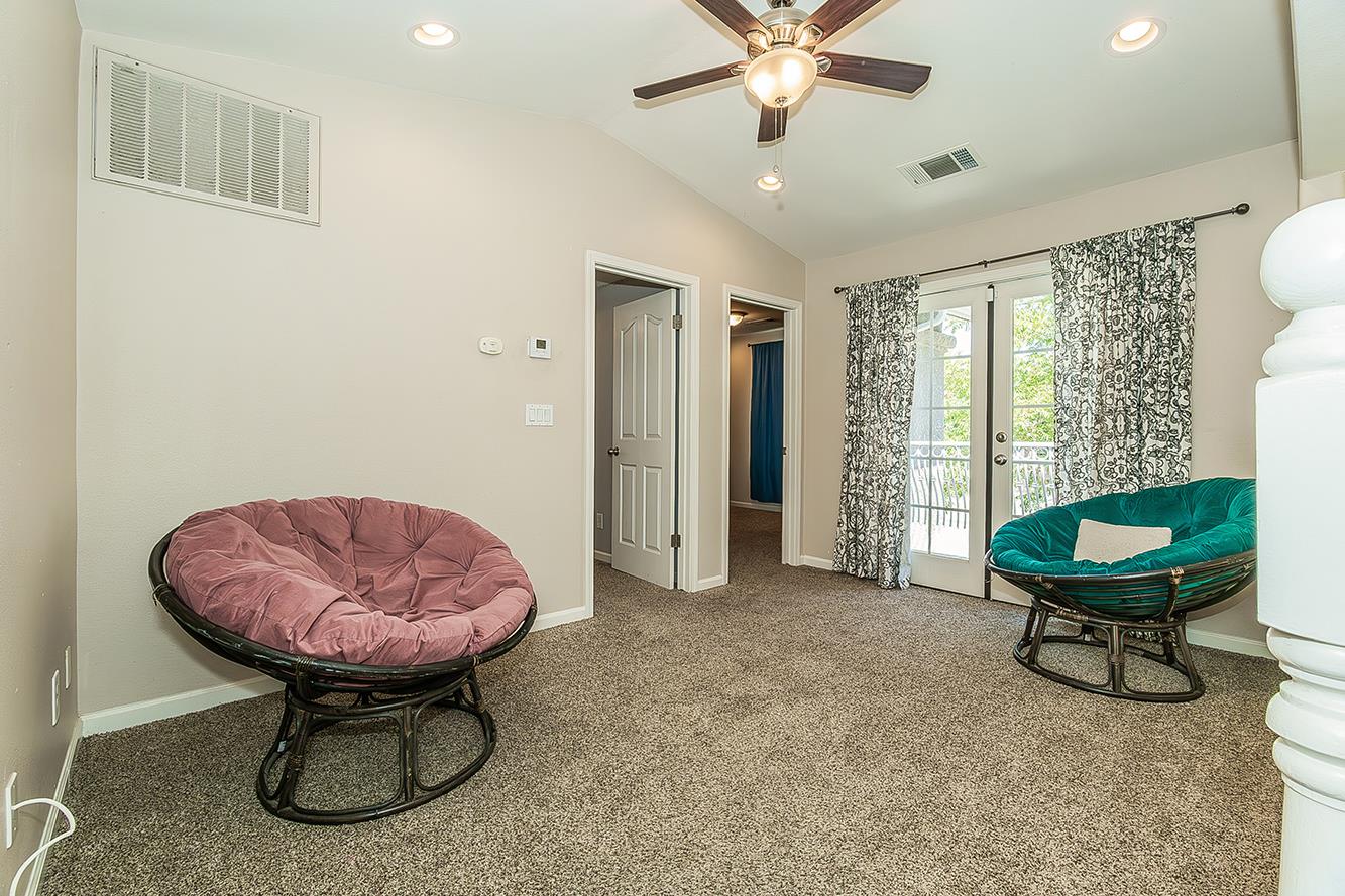 1563 South Klein Avenue Reedley, CA 93654 - Photo 46 of 81 a view of a livingroom with furniture and a fan