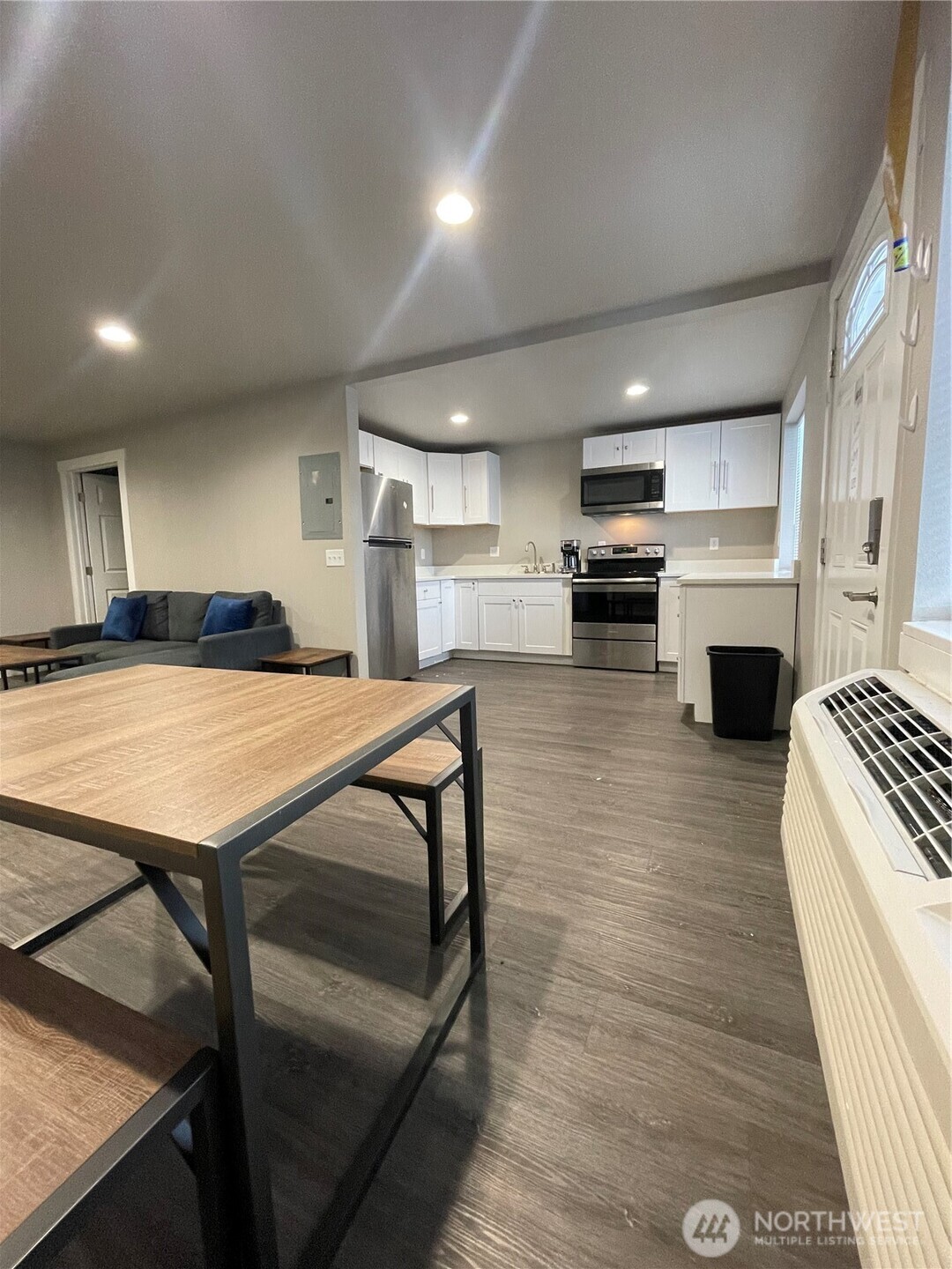 59 Elmer City Access Road Coulee Dam, WA 99116 - Photo 22 of 39 a kitchen with stainless steel appliances granite countertop a stove top oven a sink a counter space and cabinets