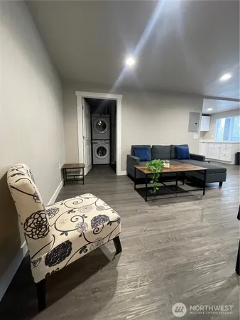a living room with furniture and a table