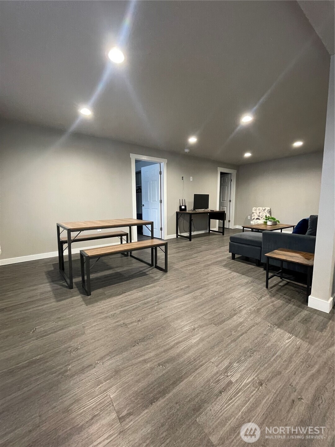 59 Elmer City Access Road Coulee Dam, WA 99116 - Photo 33 of 39 a living room with furniture and a wooden floor