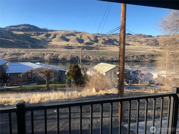 a view of a lake from a balcony