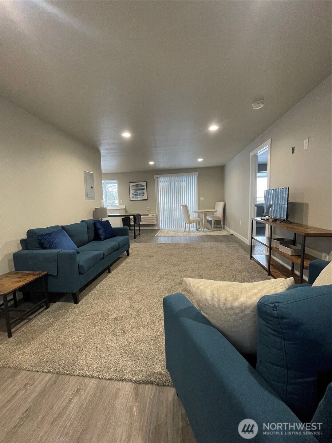 59 Elmer City Access Road Coulee Dam, WA 99116 - Photo 5 of 39 a living room with furniture and kitchen view