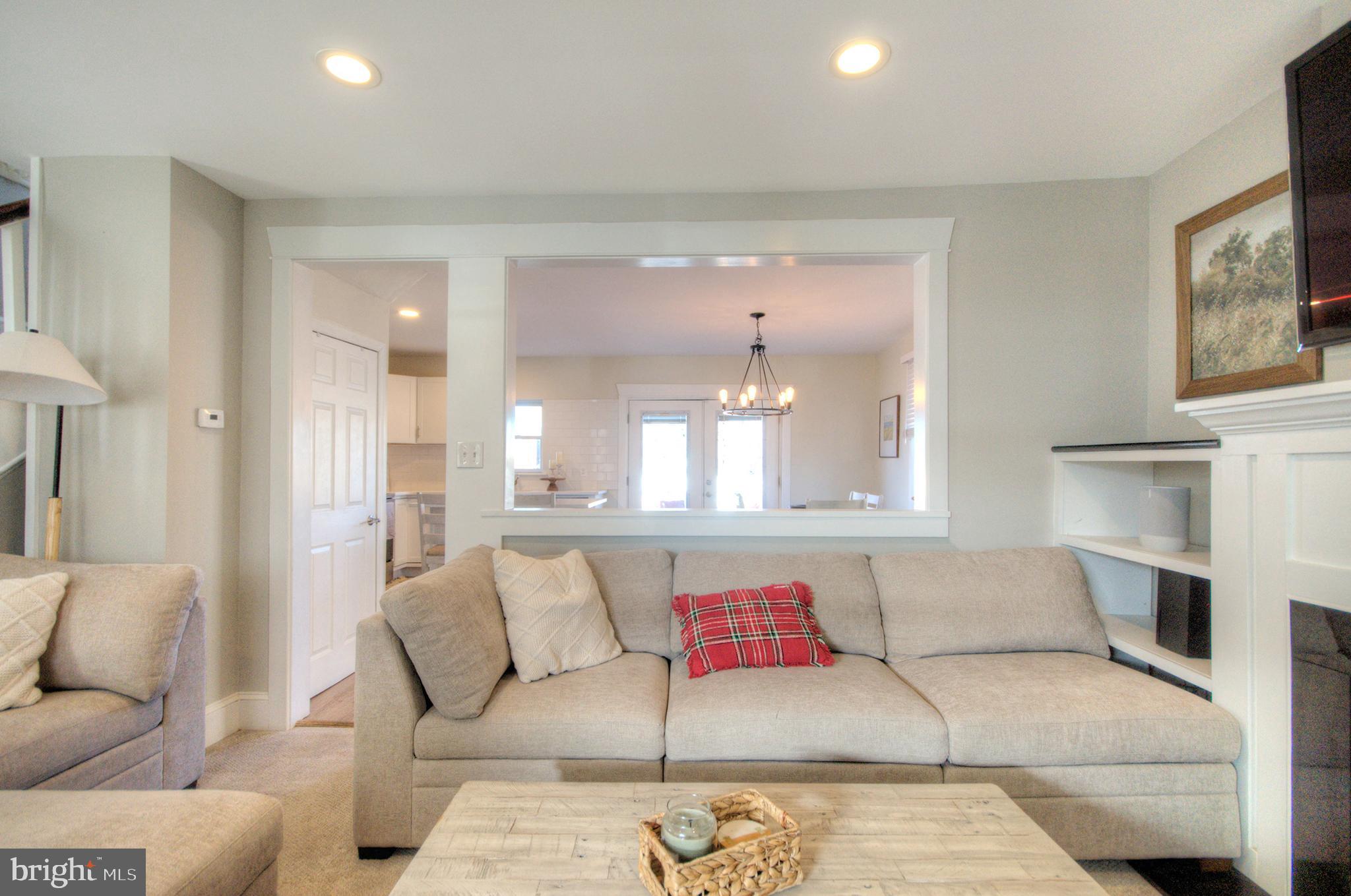 23 East Holly Haddon Township, NJ 08107 - Photo 11 of 35 a living room with furniture and a fireplace