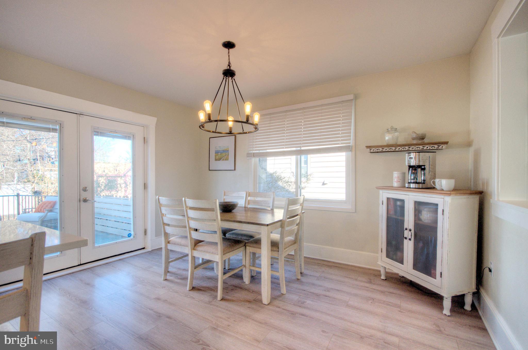 23 East Holly Haddon Township, NJ 08107 - Photo 16 of 35 a view of a dining room with furniture window and wooden floor