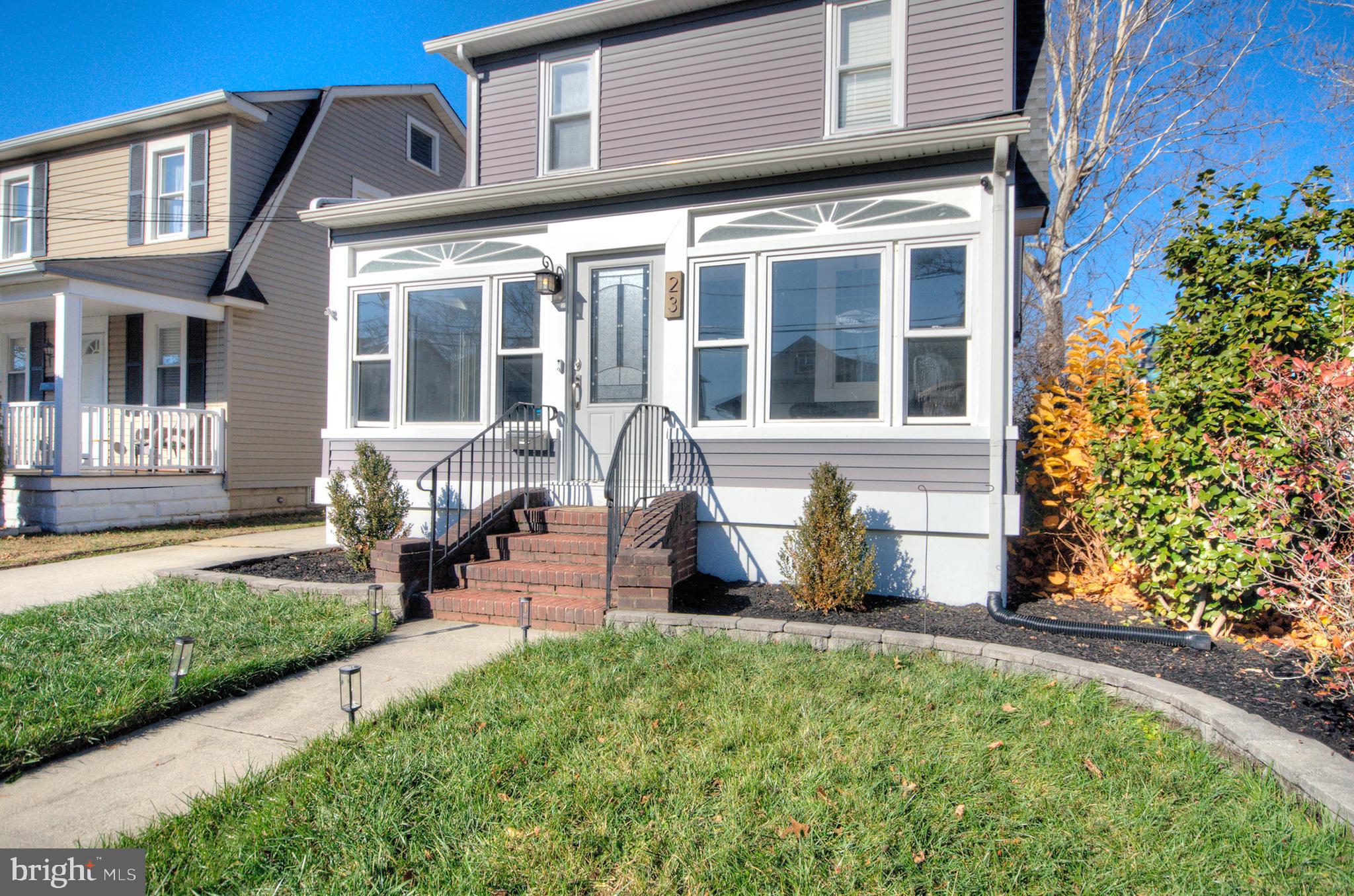 23 East Holly Haddon Township, NJ 08107 - Photo 2 of 35 a front view of a house with a yard