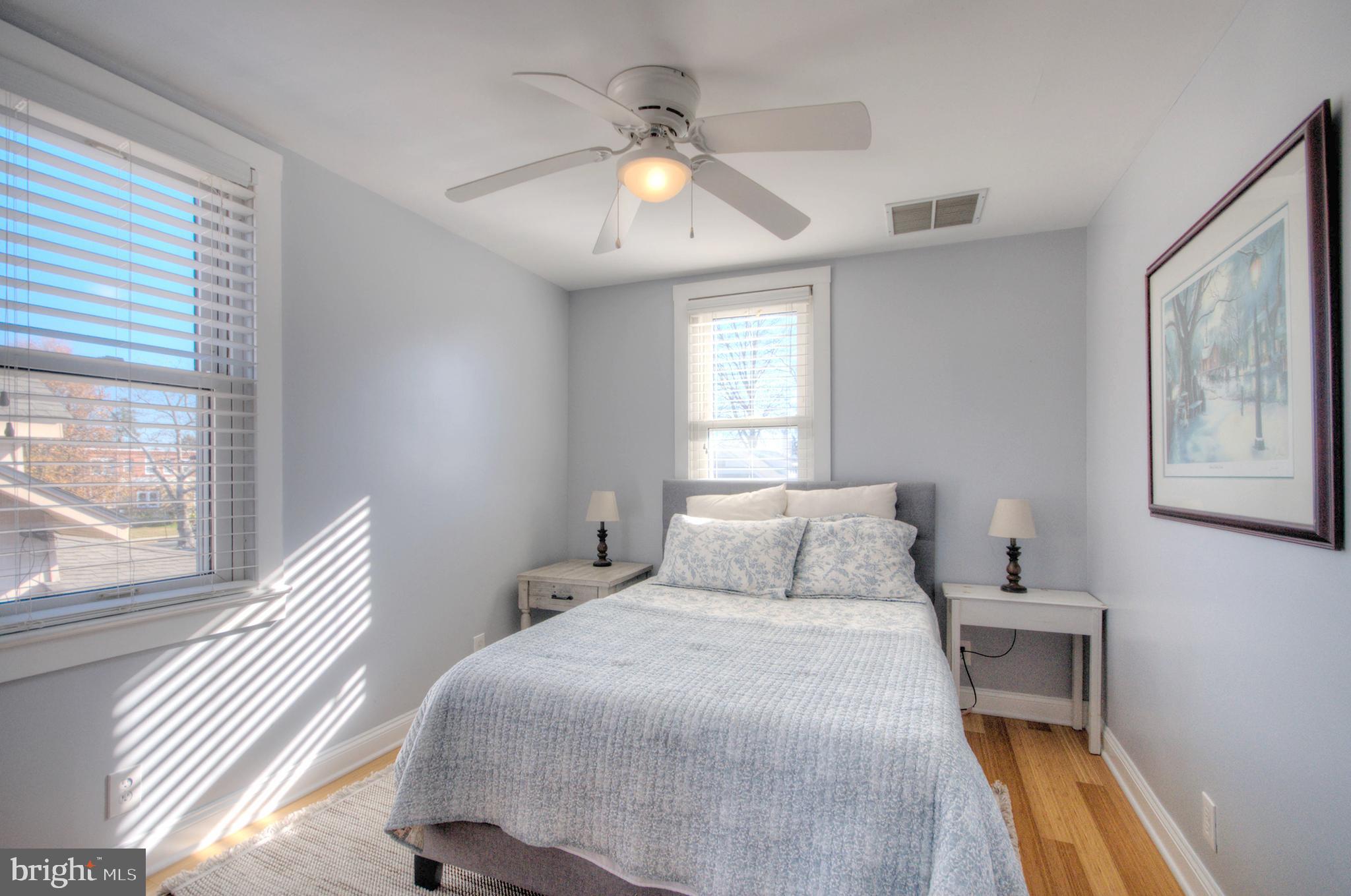 23 East Holly Haddon Township, NJ 08107 - Photo 22 of 35 a bedroom with a bed and a window