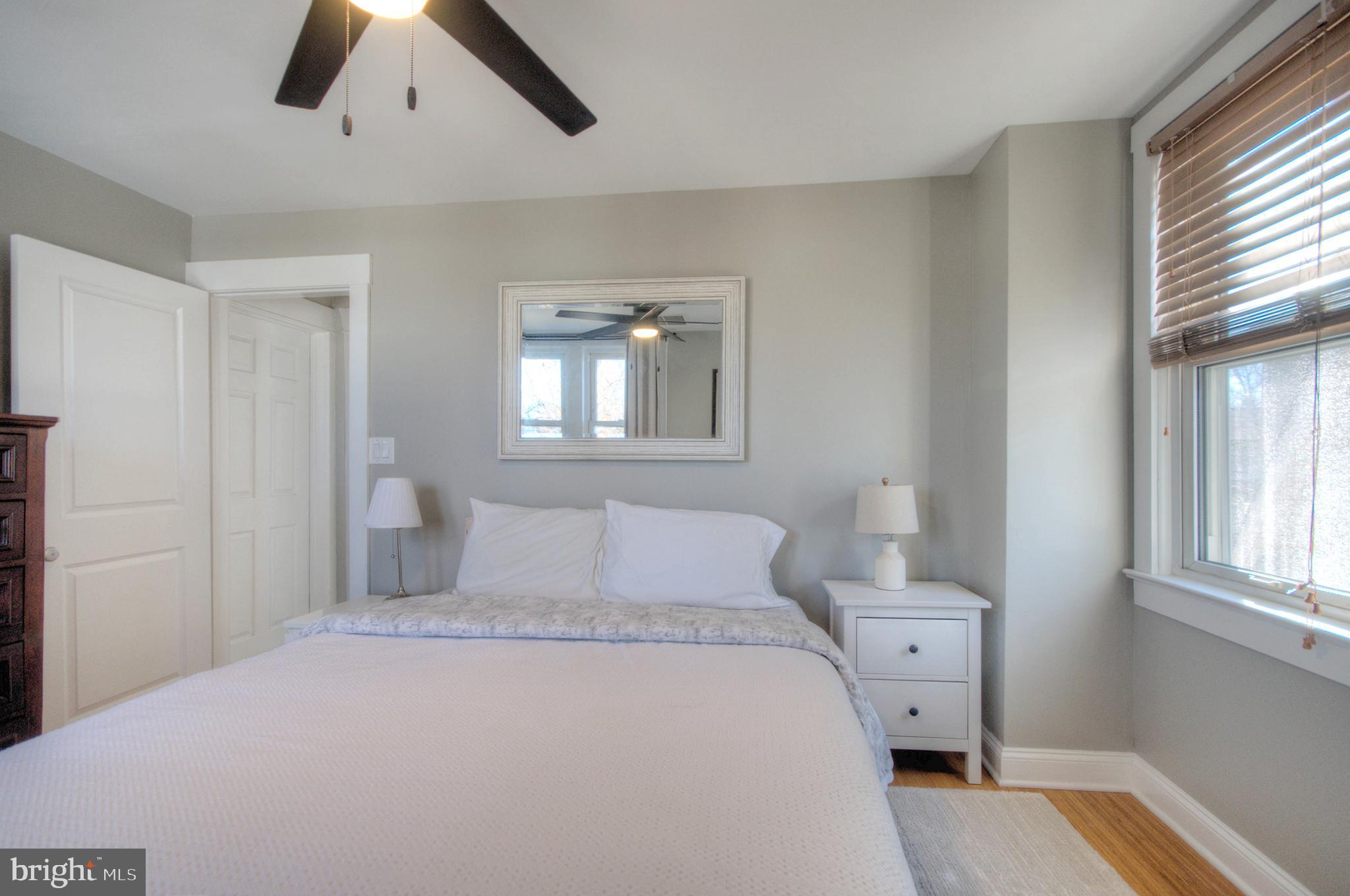 23 East Holly Haddon Township, NJ 08107 - Photo 25 of 35 a bedroom with a bed and wooden floor