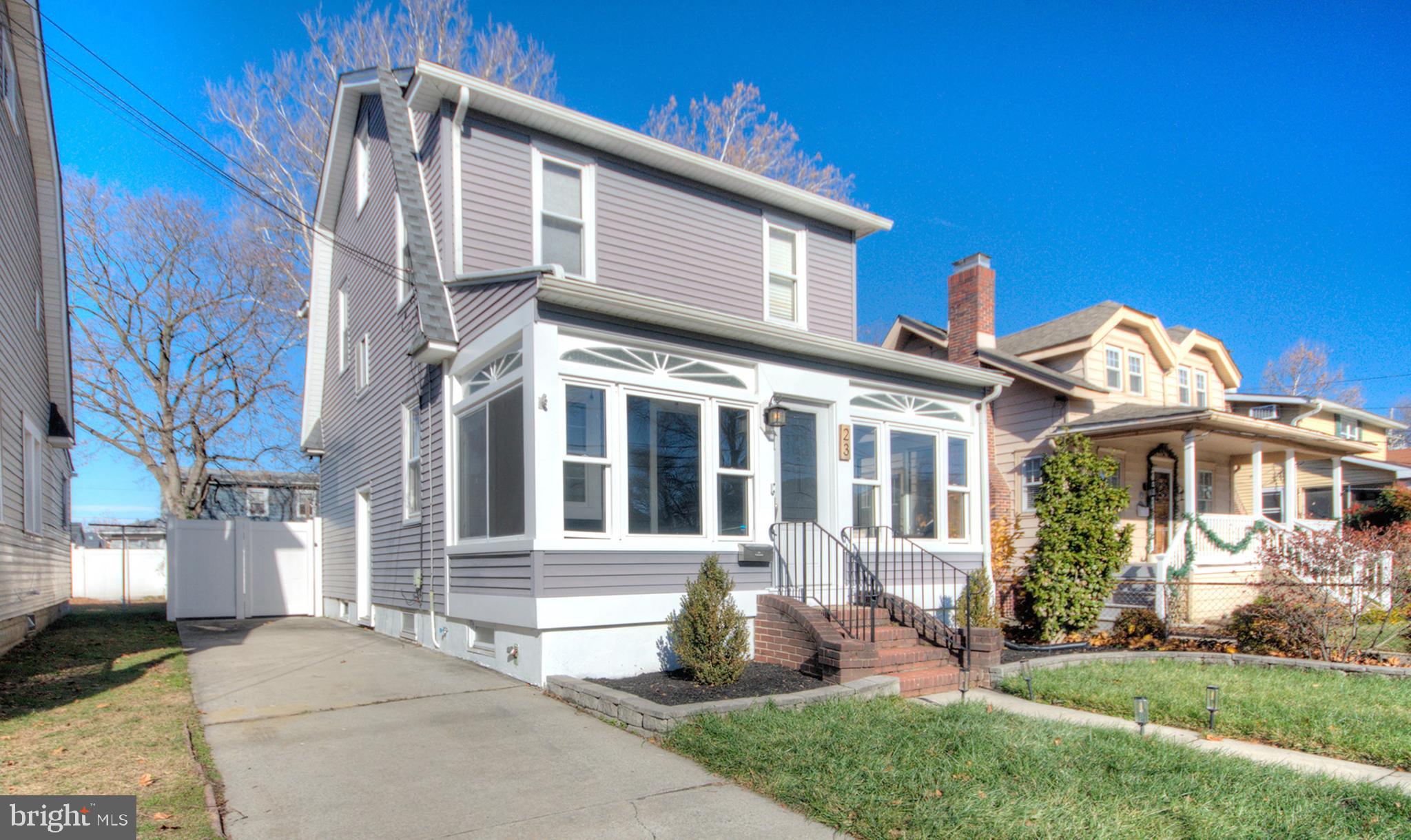 23 East Holly Haddon Township, NJ 08107 - Photo 3 of 35 a front view of a house with a yard