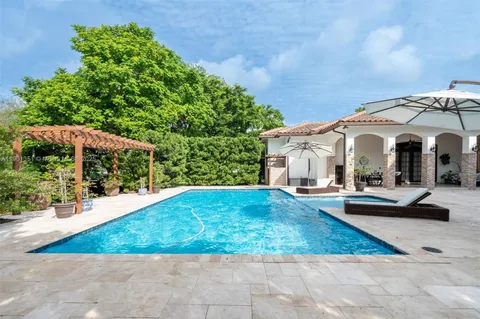 view of house with yard and entertaining space