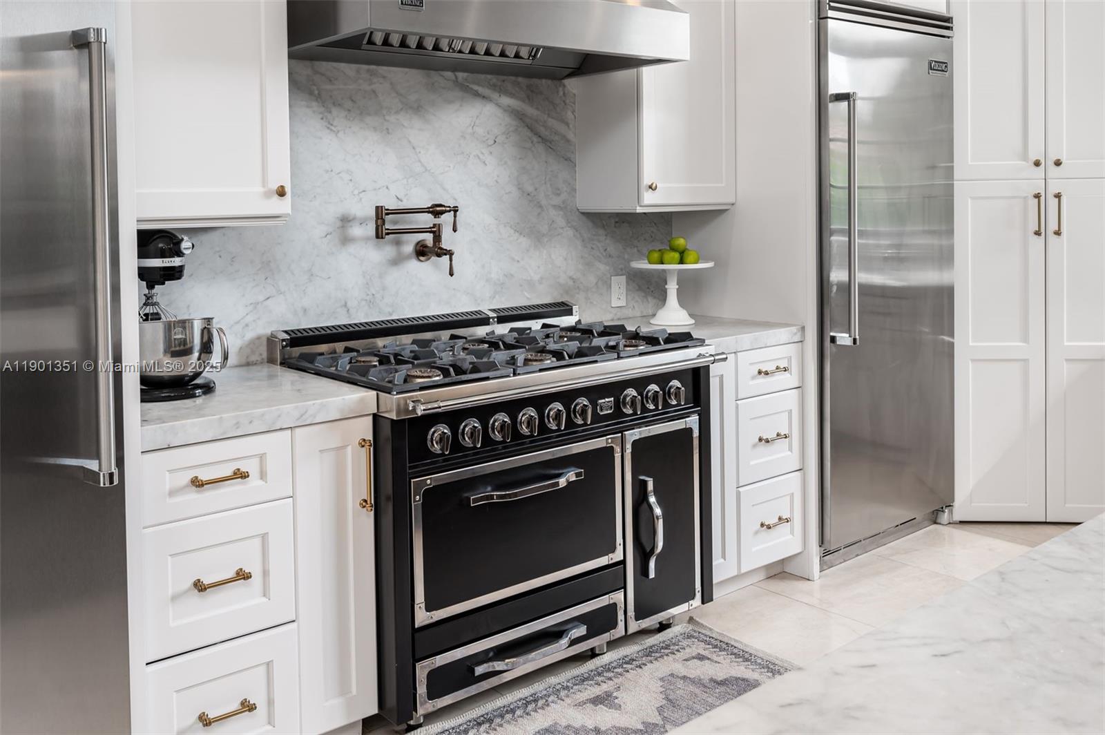 18951 Southwest 53rd Street Southwest Ranches, FL 33332 - Photo 23 of 57 a stove top oven sitting inside of a kitchen
