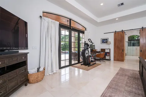 a bathroom with a tub sink and shower