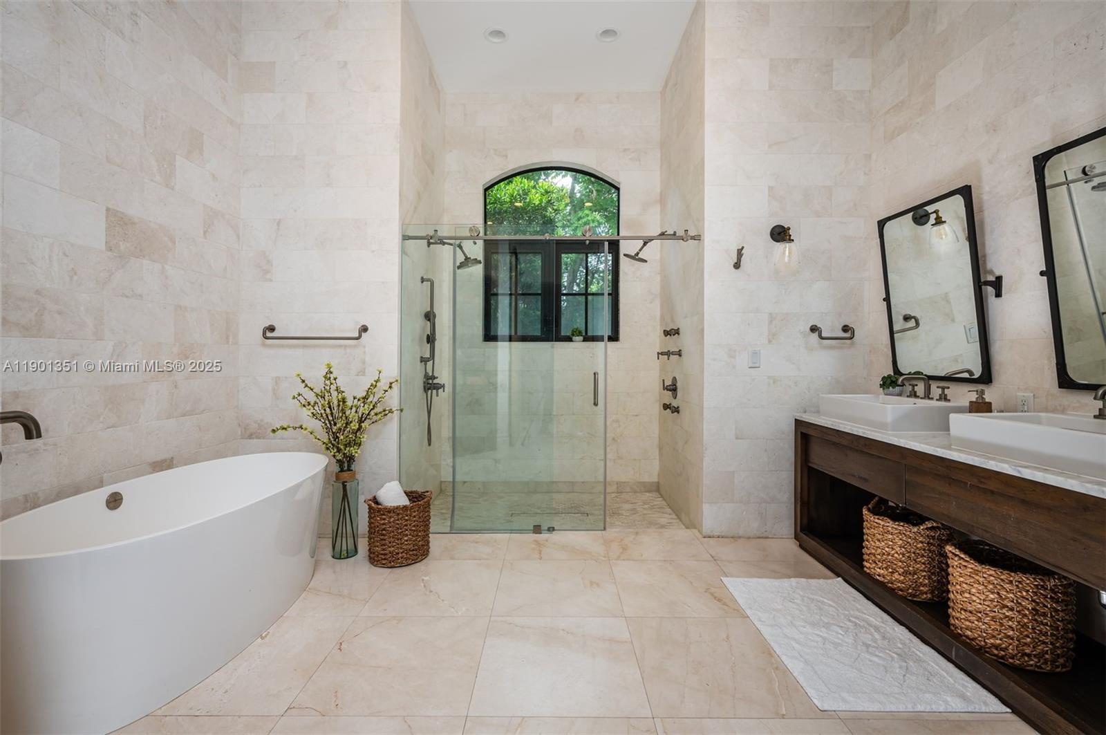 18951 Southwest 53rd Street Southwest Ranches, FL 33332 - Photo 30 of 57 a bathroom with a tub sink and shower