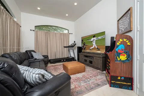 a bathroom with a sink toilet a mirror and shower