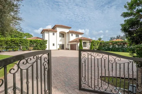 a view of a entryway with flower pots