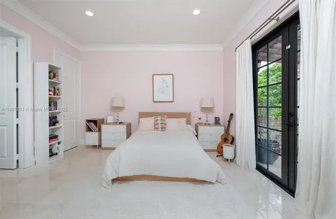 an aerial view of a house with outdoor space patio and lake view