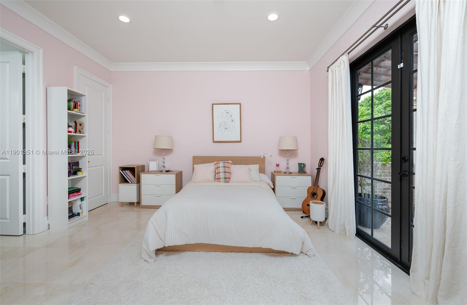 18951 Southwest 53rd Street Southwest Ranches, FL 33332 - Photo 43 of 57 a bedroom with a bed and a large window