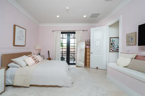 an aerial view of residential house with outdoor space and swimming pool