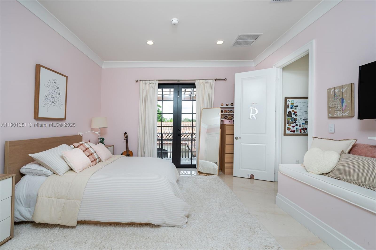 18951 Southwest 53rd Street Southwest Ranches, FL 33332 - Photo 44 of 57 a bedroom with a large bed and furniture