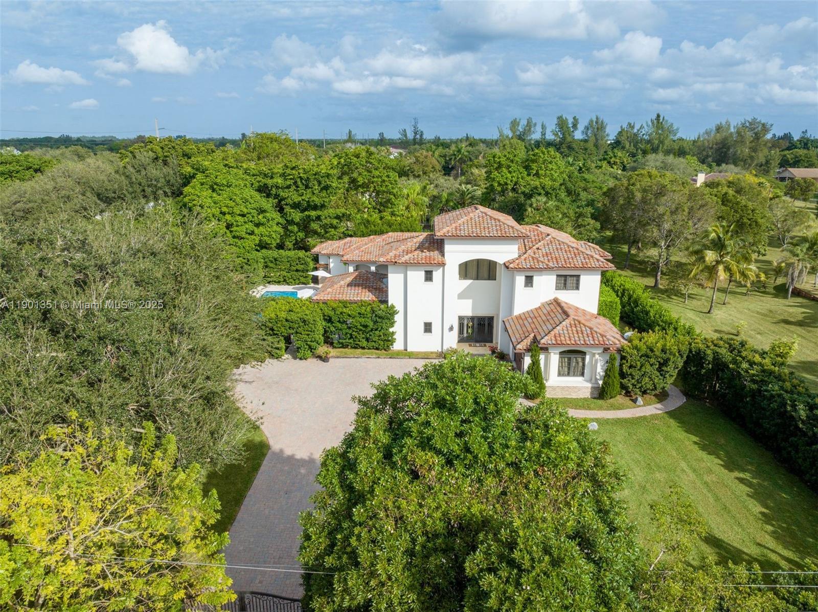 18951 Southwest 53rd Street Southwest Ranches, FL 33332 - Photo 49 of 57 an aerial view of a house