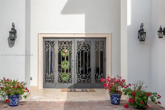 a view of a entryway door front of a house