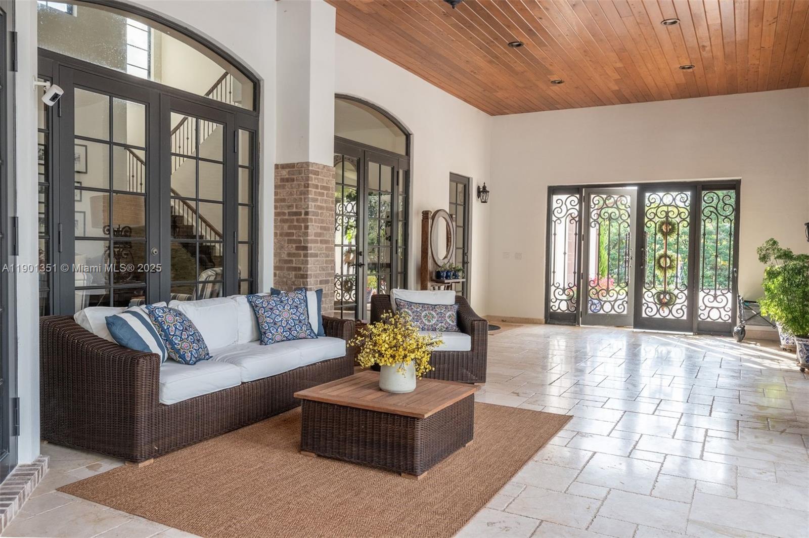 18951 Southwest 53rd Street Southwest Ranches, FL 33332 - Photo 8 of 57 a living room with furniture and a large window