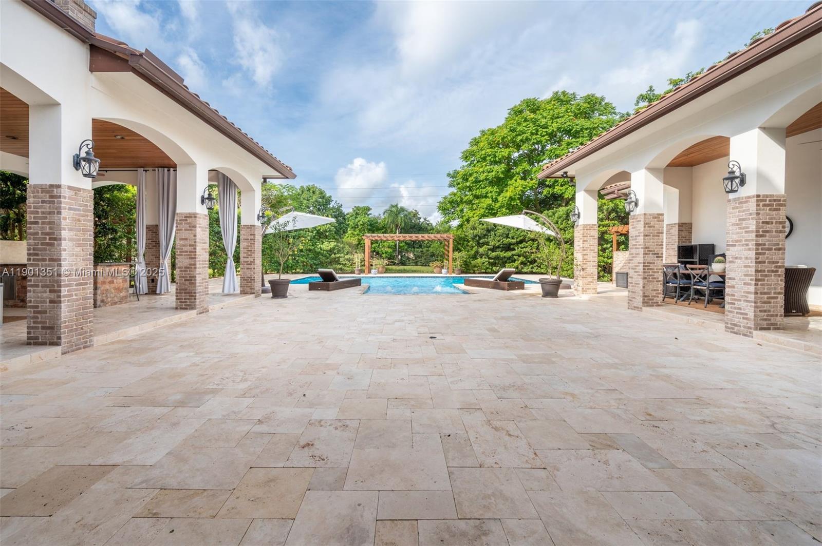 18951 Southwest 53rd Street Southwest Ranches, FL 33332 - Photo 10 of 57 a view of a house with porch and furniture