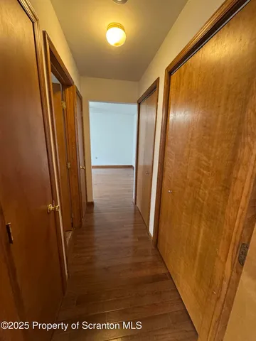 a view of empty room with windows