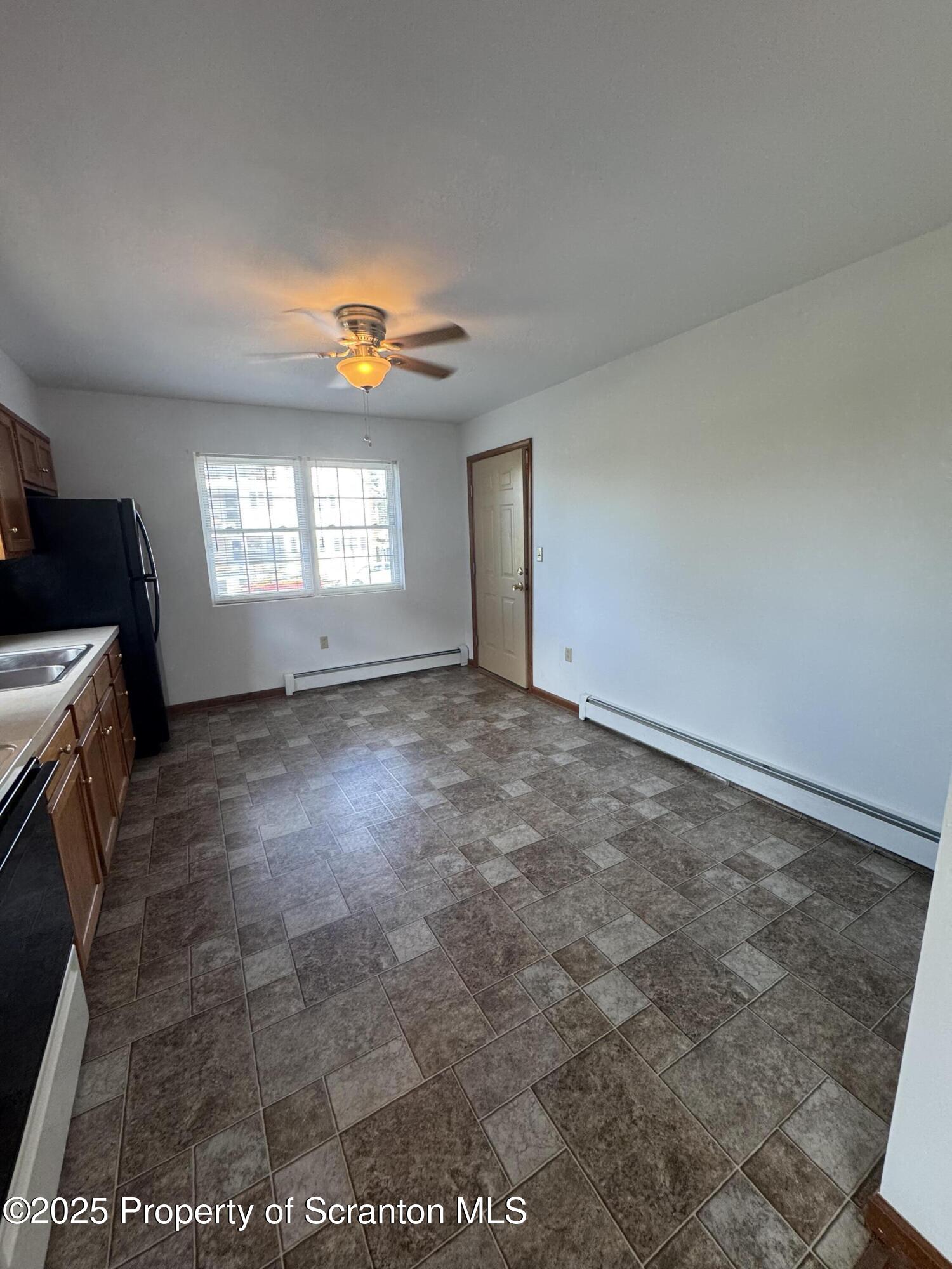 622 Terrace Street, Unit 1R Dunmore, PA 18512 - Photo 4 of 17 a view of an empty room with a window