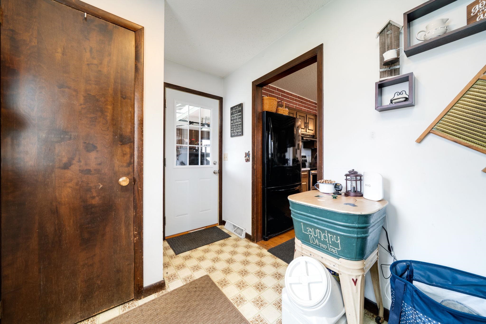 109 13th Street Oregon, IL 61061 - Photo 15 of 44 a dining room with a table and chairs