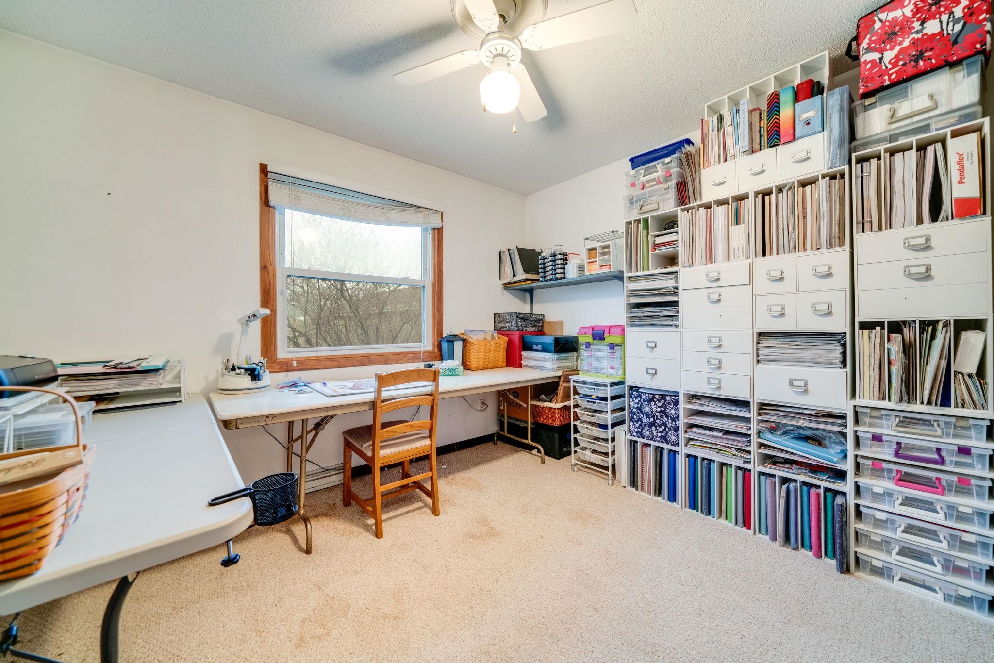 109 13th Street Oregon, IL 61061 - Photo 25 of 44 a reading room with furniture and a book shelf