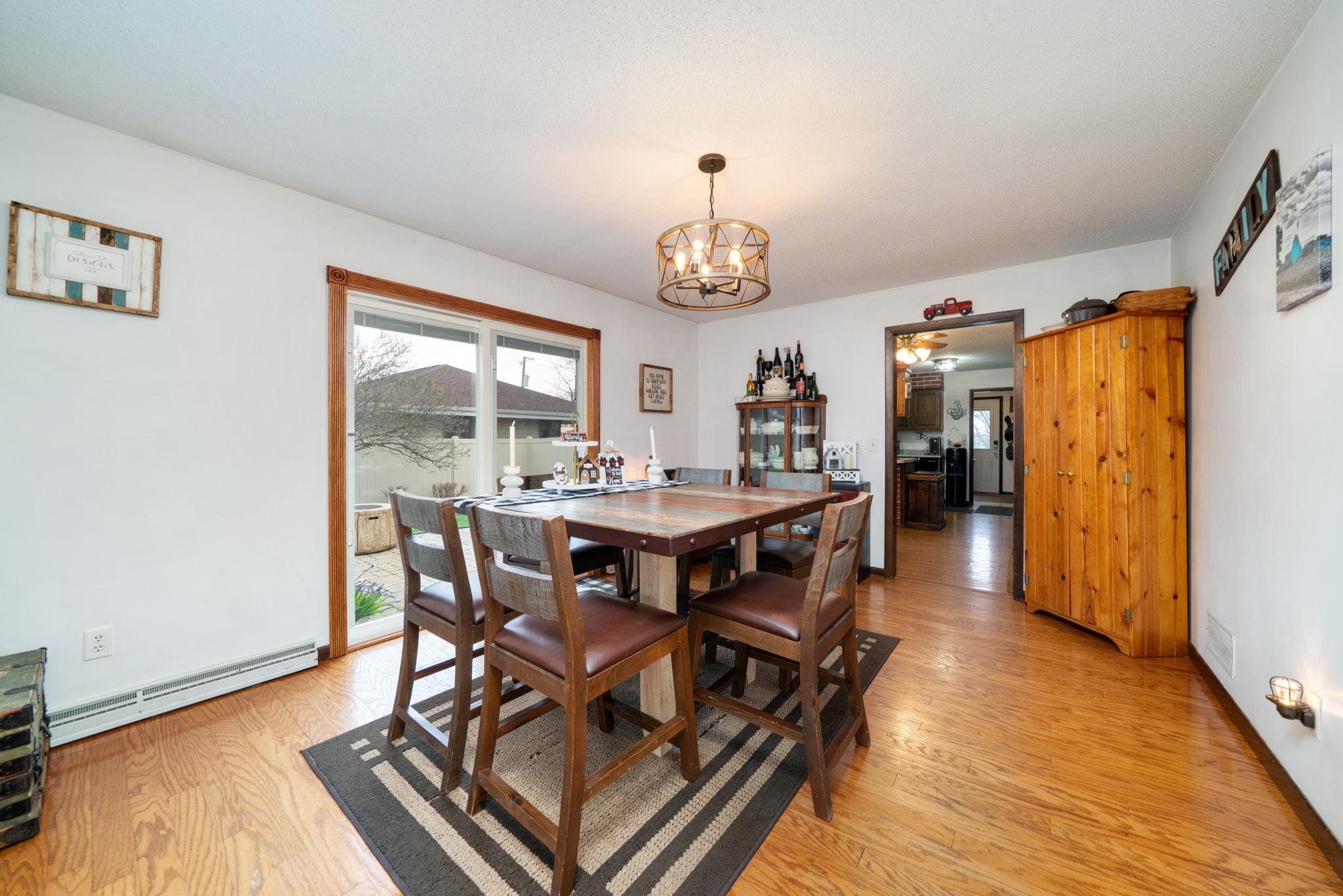 109 13th Street Oregon, IL 61061 - Photo 3 of 44 a view of a dining room with furniture window and wooden floor