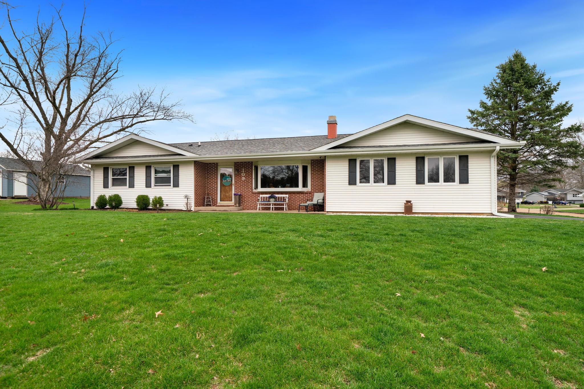 109 13th Street Oregon, IL 61061 - Photo 40 of 44 a front view of house with yard and green space
