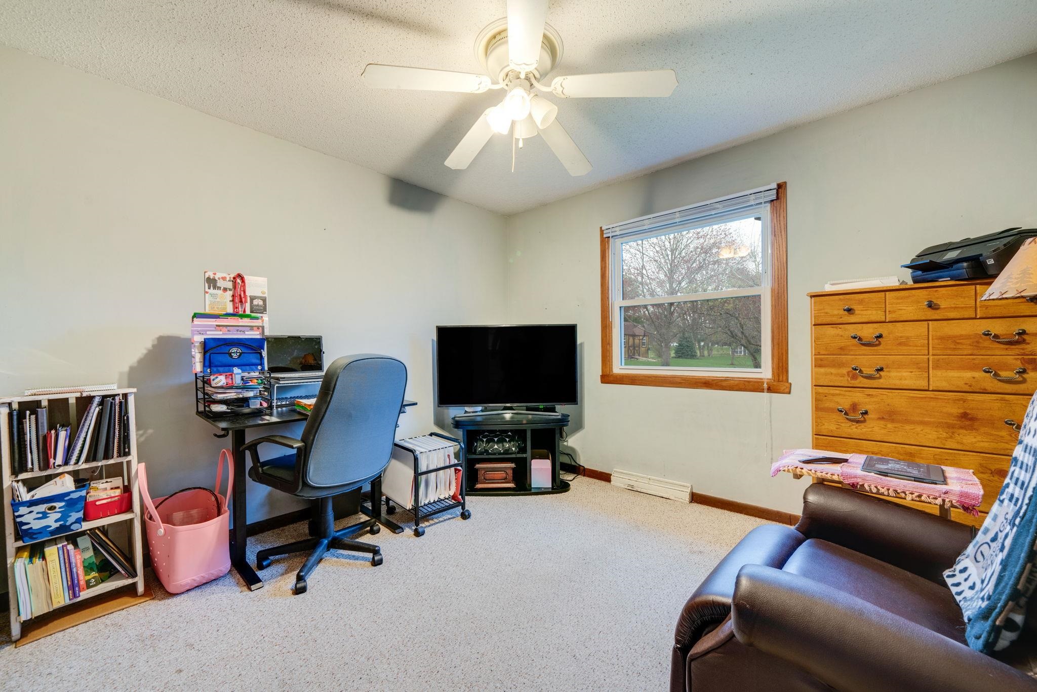 109 13th Street Oregon, IL 61061 - Photo 8 of 44 a reading room with furniture and a window