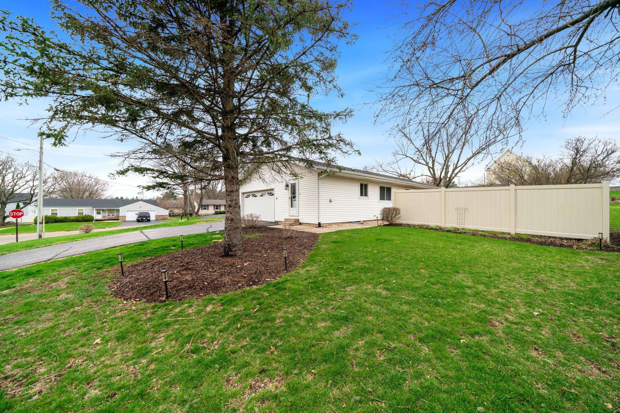 109 13th Street Oregon, IL 61061 - Photo 10 of 44 a view of a backyard with large trees