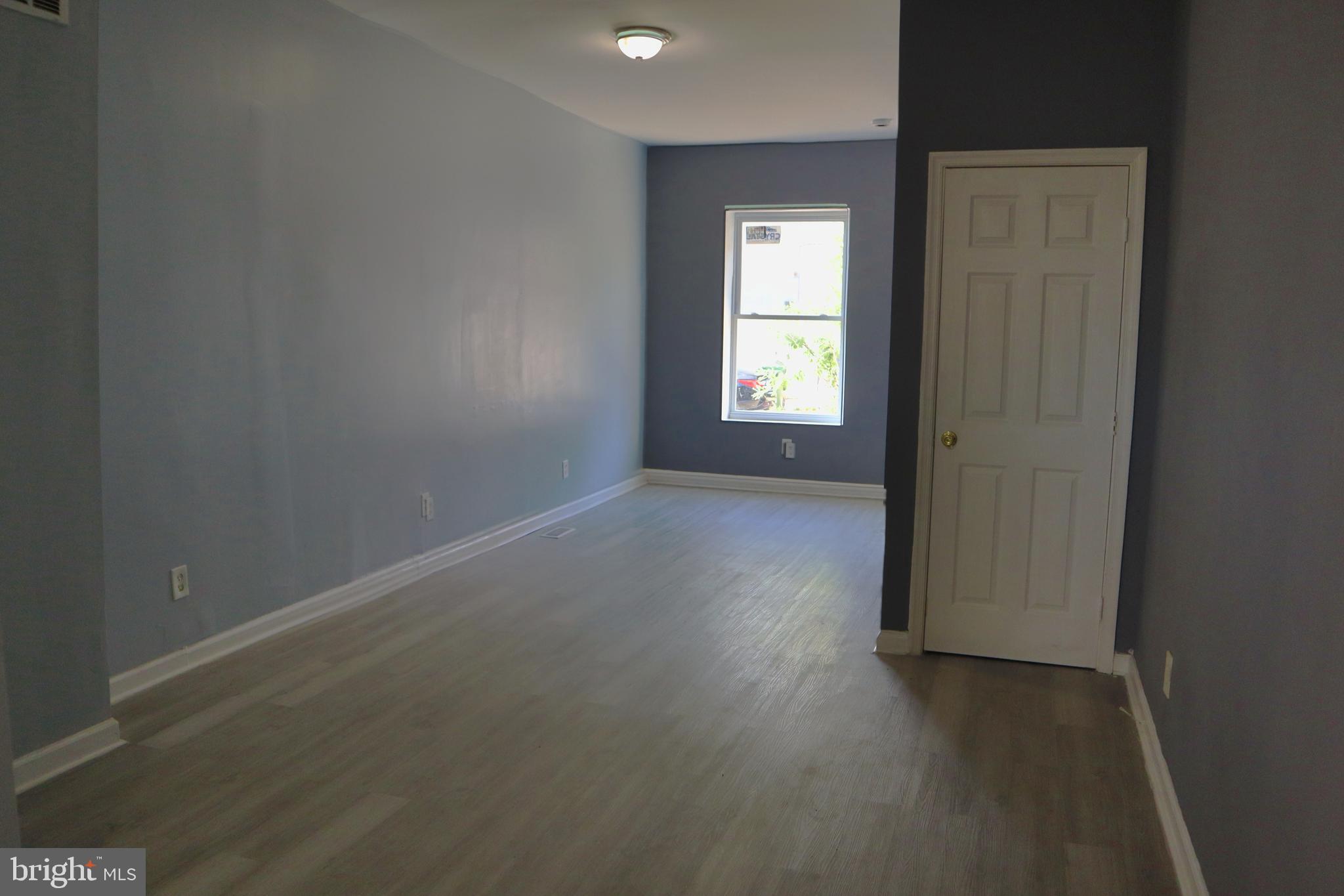 2011 Hollins Street Baltimore, MD 21223 - Photo 15 of 15 an empty room with a window