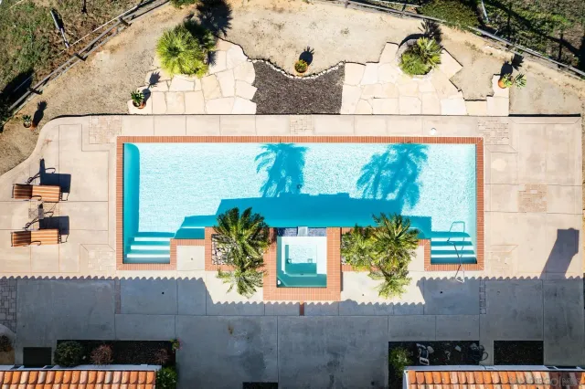 a view of a terrace with mountains and a mountain view