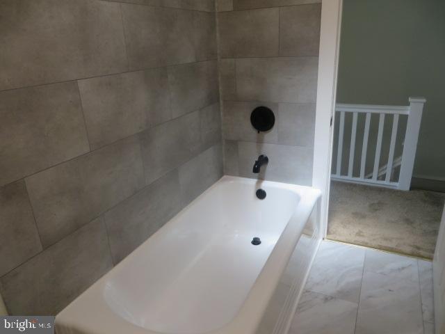 2617 Hobson Street Philadelphia, PA 19142 - Photo 13 of 14 a bathroom with a tub