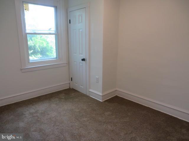 2617 Hobson Street Philadelphia, PA 19142 - Photo 10 of 14 an empty room with a window