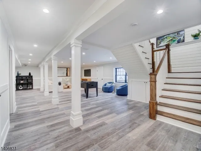 a view of a living room and entryway