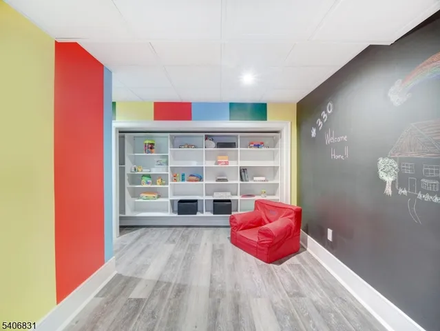 a room with furniture and wooden floor