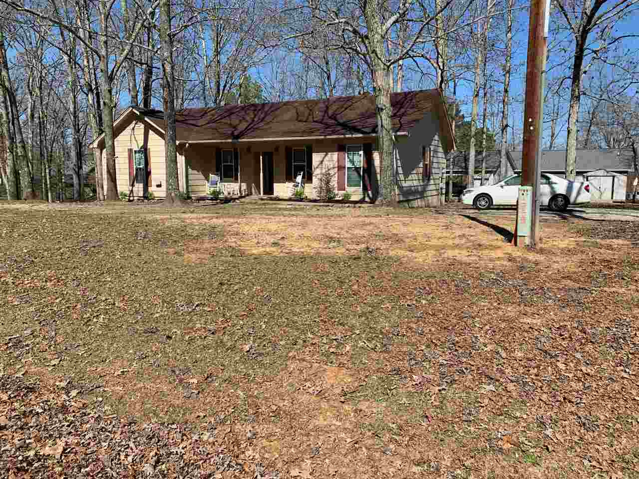 100 Montezuma Road Henderson, TN 38340 - Photo 18 of 20 a front view of a building with a yard