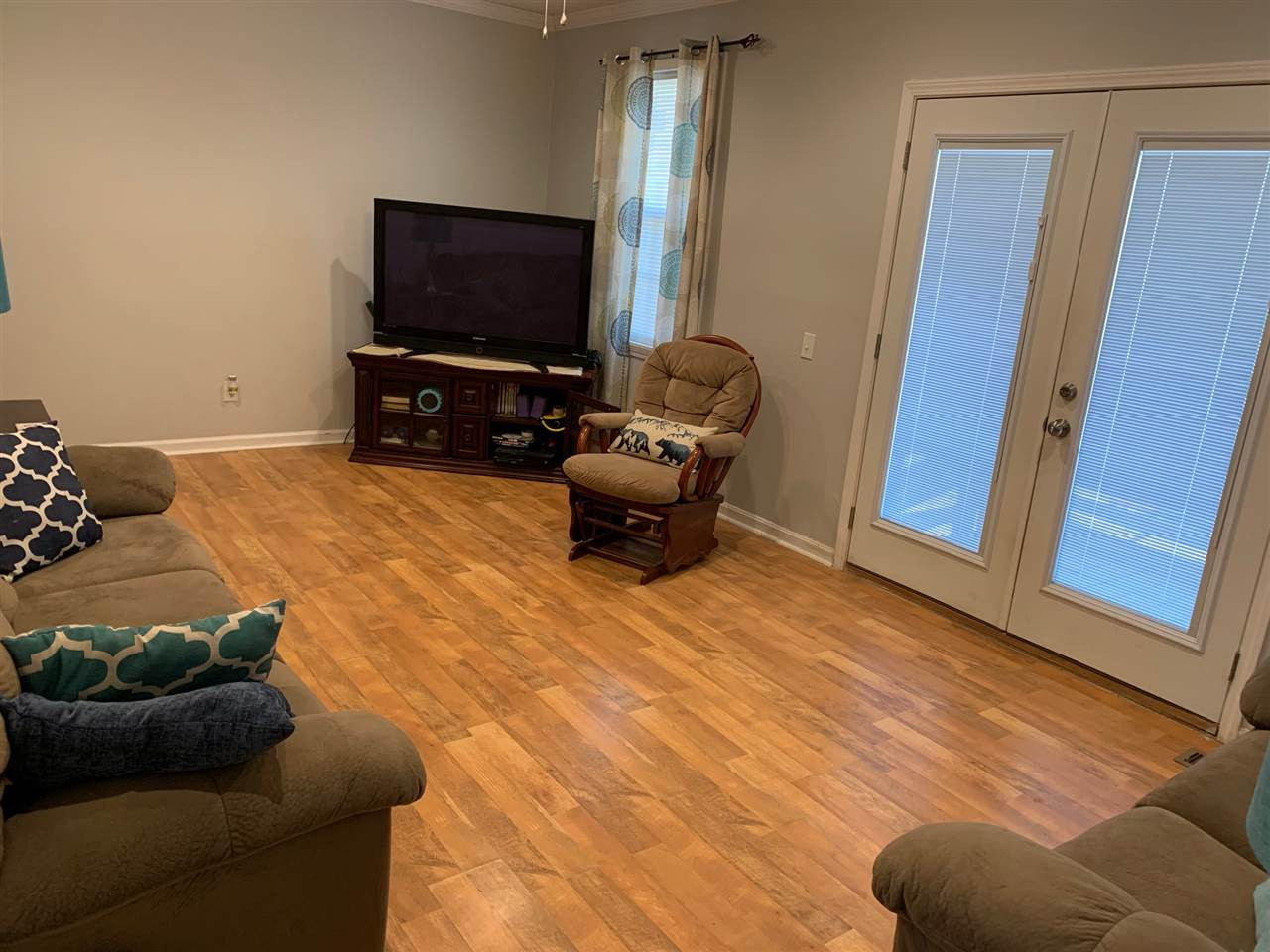 100 Montezuma Road Henderson, TN 38340 - Photo 3 of 20 a living room with furniture and a flat screen tv